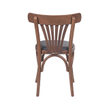 La chaise de restaurant en bois LEGEND assise en éco-cuir noir